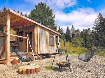 The cabin and outdoor seating