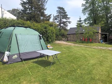 Grass tent pitch