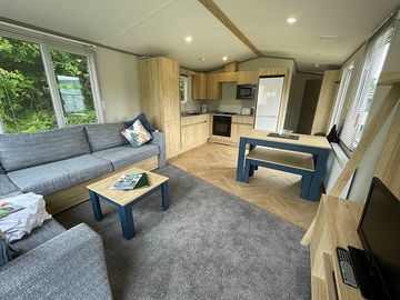 Open plan living, dining and kitchen area