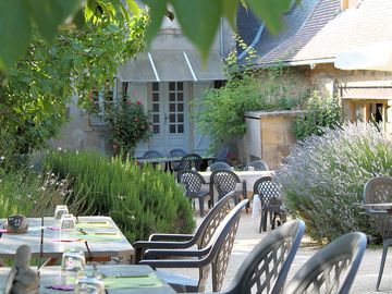 Courtyard restaurant surrounded by fragrant herbs