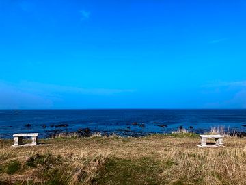 Bench seating on the headland overlooking the moray firth (added by manager 24 jul 2022)