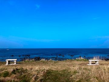 Bench seating on the headland overlooking the moray firth