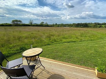 View of the land and lake from the decking