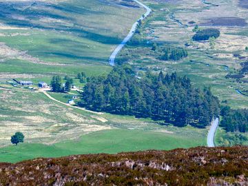 View of shepherd's hut from the top of the surrounding hills
