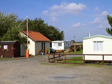 We are a small informal site made up of 24 static vans and 25 grass touring pitches.