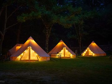 Bell tent pitches at night (added by manager 06 feb 2024)