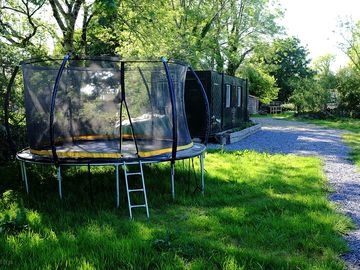 The trampoline next to the campsite kitchen.