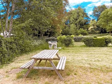 Picnic table and barbecue