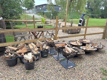 Wood buckets available to purchase and fire pits for hire