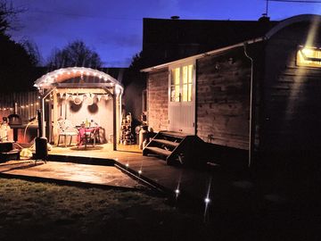 Shepherd's hut lit up at night (added by manager 13 dec 2023)