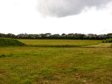 Grass motorhome and tent area