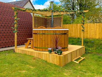 Our brand new wood-fired hot tub, ready for use - luxurious and eco-friendly !