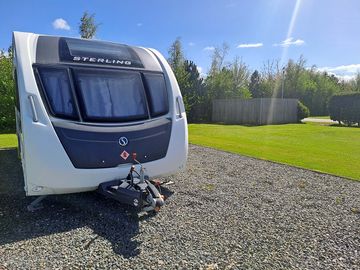 Fully-serviced hardstanding touring pitch