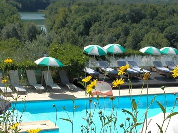 Pool with deckchairs