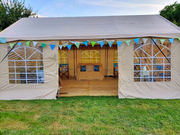 Communal tent with sofas