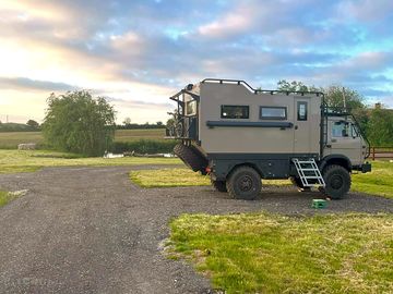 Overlander motorhome staying on site