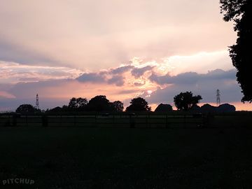 Sunset over the site (added by manager 25 jul 2018)
