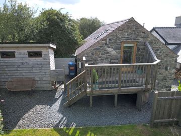 Balcony looking out to mountains, with private shower unit to the left