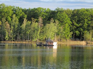 Lodge with decking on the pond (added by manager 08 nov 2023)