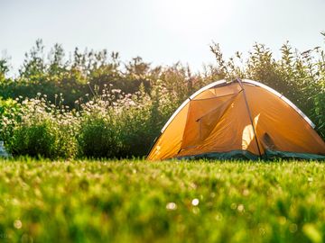 Non-electric grass tent or trailer tent pitch