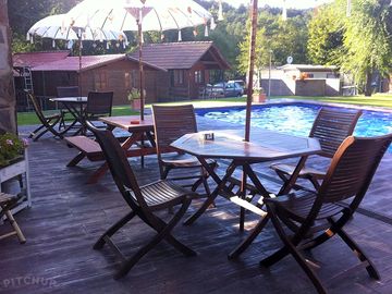 Outdoor pool with seating on a terrace