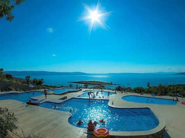 Swimming pool complex with adriatic views