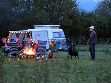 There is a communal fire pit on each camping pitch for cosy evenings together