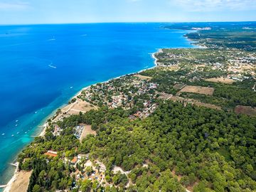 Enjoy the comfort of accommodation in the pine forest, olive grove shade, or right by the sea!
