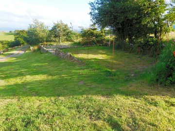 Electric grass tent pitch