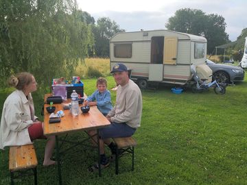 Family on the camping meadow