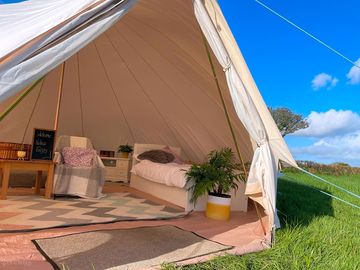 Example interior of our furnished bell tent, bessie, equipped for a convenient and comfortable stay. (added by manager 24 mar 2024)
