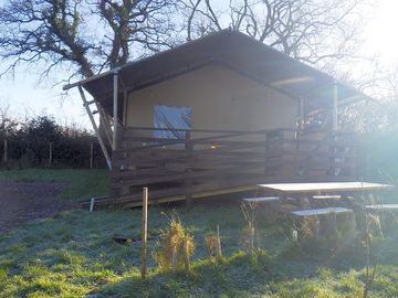 Badger safari lodge in the winter sun with a touch of frost