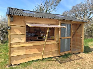 The field kitchen is a shared space with gas hob, sink and fridge-freezer (added by manager 29 jun 2022)