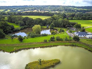 Drone view of top and bottom fishing lakes, carp and roach huts