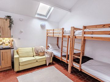 Bunkhouse beds and sitting area