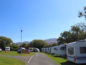 Grass pitches with mountain views