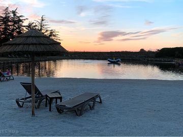 Pool and beach at sunset