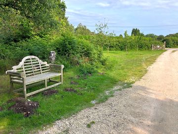 Wait for a taxi or your friends on this luytens style bench