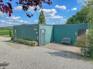 Toilet/shower block