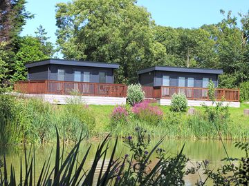 The lodges viewed from the fishing lake (added by manager 28 nov 2023)