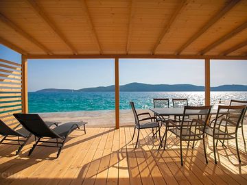 Deck with loungers and a table