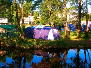 Pitch by the river