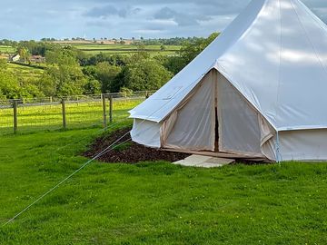 Bell tent pitch with rural views