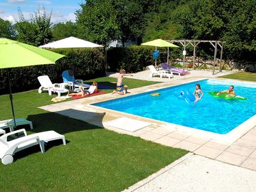 Swimming pool with inflatable toys