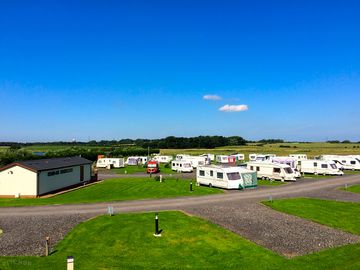 Caravan pitches and amenities building