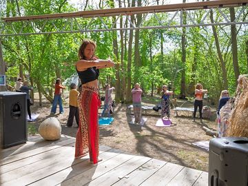 Taking a yoga class from the stage