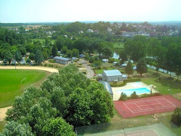 Aerial view of the tennis court and swimming pool