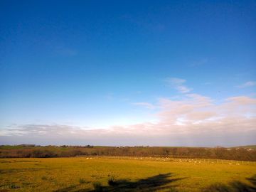 Microlights flying over the fields