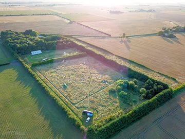 The big sky hideaway from above, with camping meadow in the foreground (added by manager 22 jan 2024)