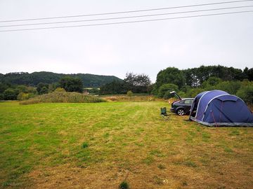 Campsite. portaloos are near the entrance and river is to the back